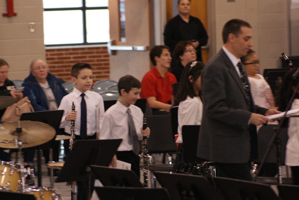 2018 SV Dinner Concert - Gabriel entering the gym to play in the band